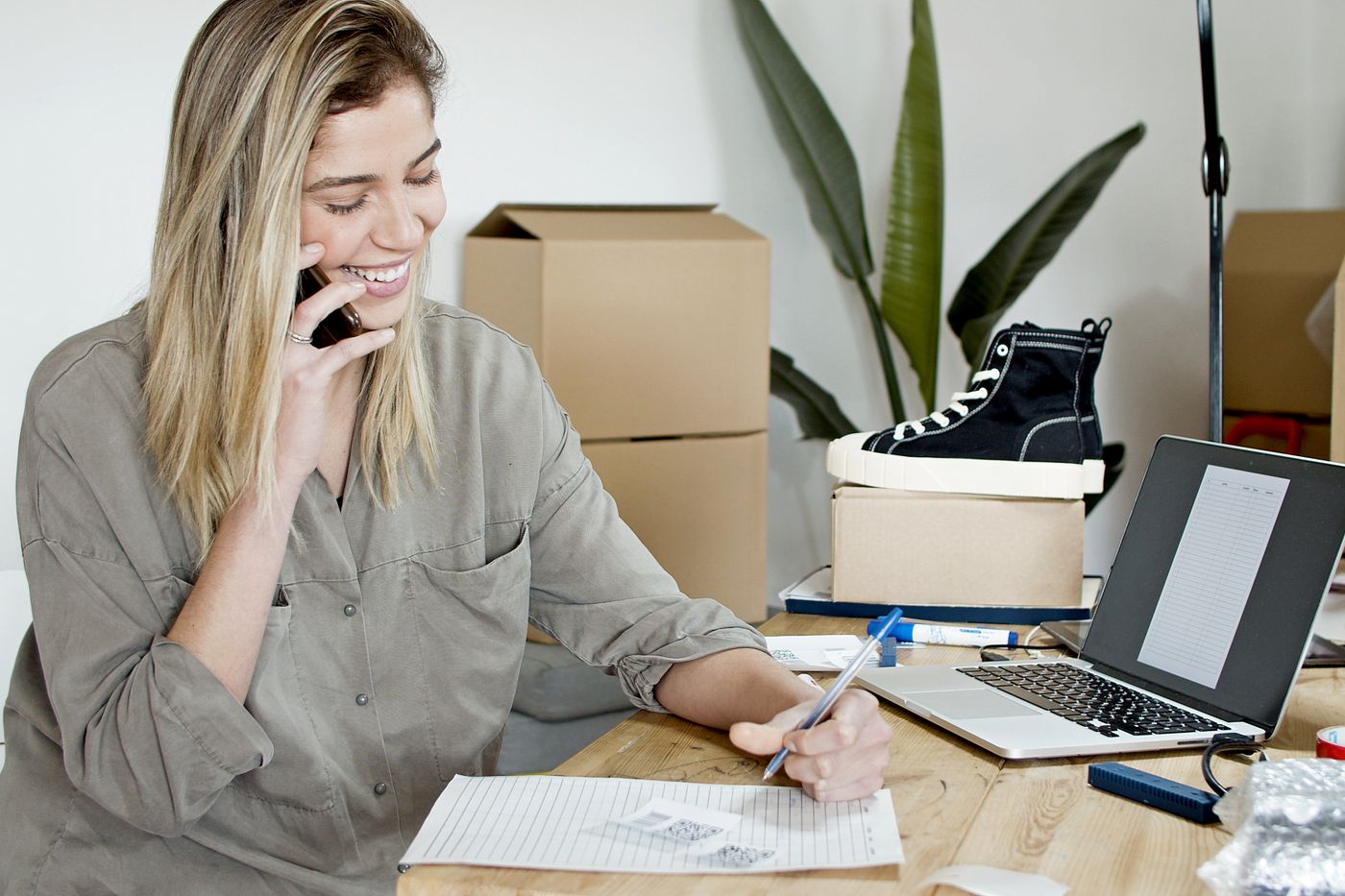A business owner managing customer enquiries online